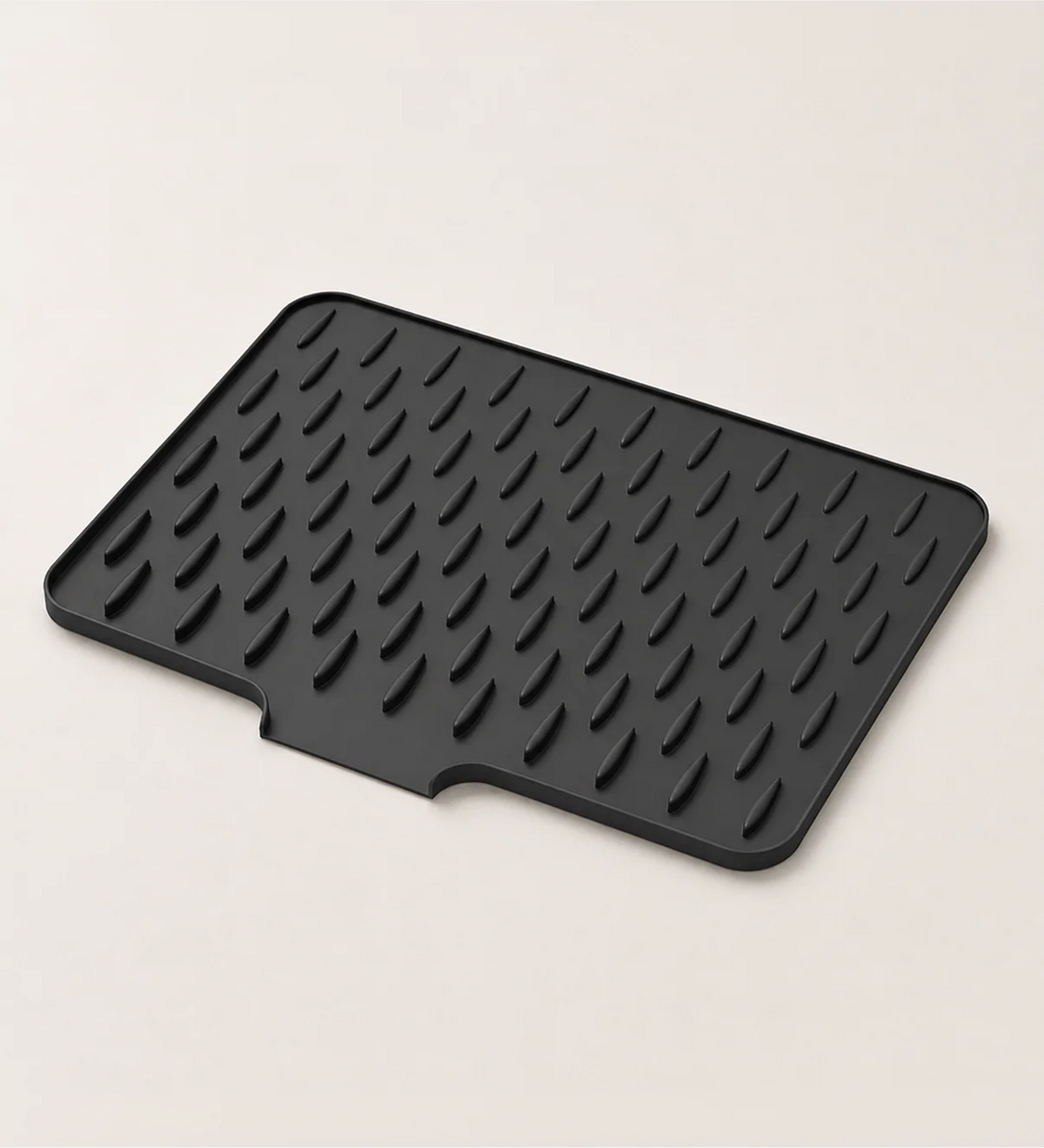 Non-slip silicone sink drying mat draining dishes beside the sink